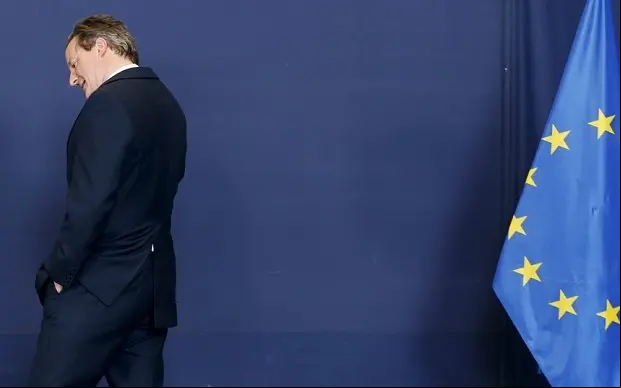 Britain's Prime Minister David Cameron arrives to pose for a family photo during a European Union leaders summit in Brussels April 23, 2015. European Union leaders who decided last year to halt the rescue of migrants trying to cross the Mediterranean will reverse their decision on Thursday at a summit hastily convened after nearly 2,000 people died at sea.   REUTERS/Francois Lenoir